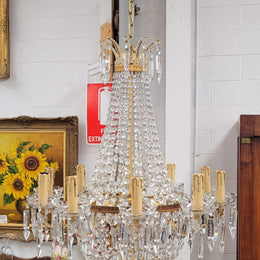 Fine French Empire basket shaped crystal chandelier. Consisting of ten exterior arms and four interior lights. It has stunning crystal's with prism drops. It has been sourced from France fully rewired to Australian standards.