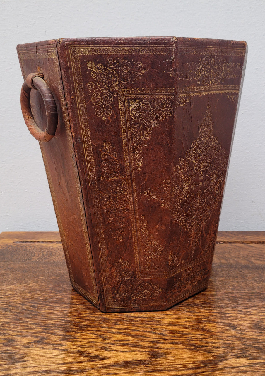 Vintage Italian tooled leather waste bin. It has been sourced locally and is in good original detailed condition. Please view photos as they help form part of the description.