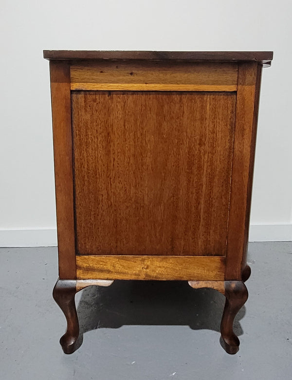 Queensland side cabinet of generous proportions. It has 1 drawer and one door with plenty storage space. In good original detailed condition.