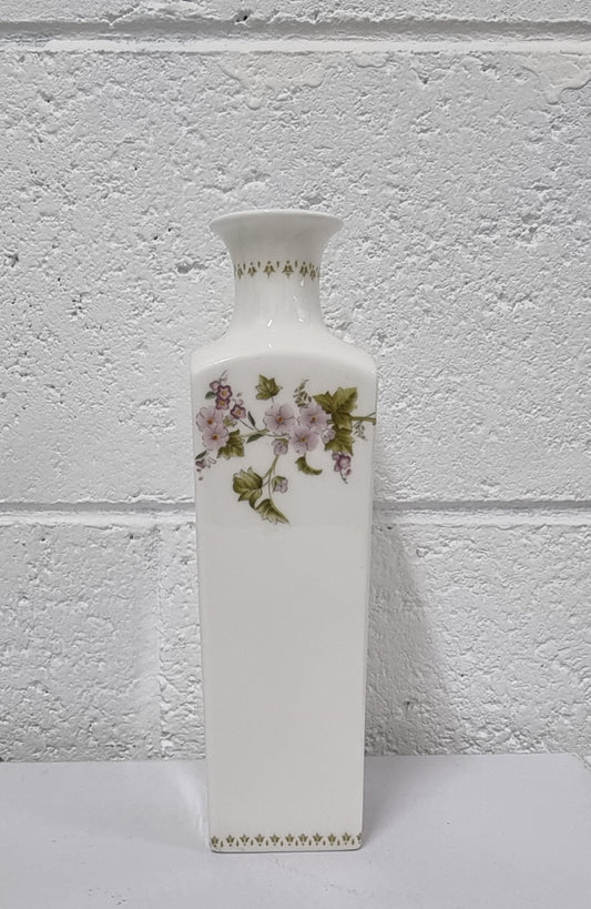 Lovely floral Wedgwood white vase with a pretty design in good condition, please view photos as they help form part of the description.