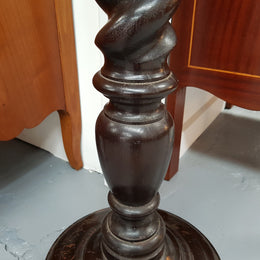 A Victorian round walnut barley twist pedestal/planter and in good original condition.