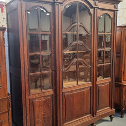 Late 19th Century French Oak three door bookcase. It has fully adjustable shelfs and is in good original detailed condition.