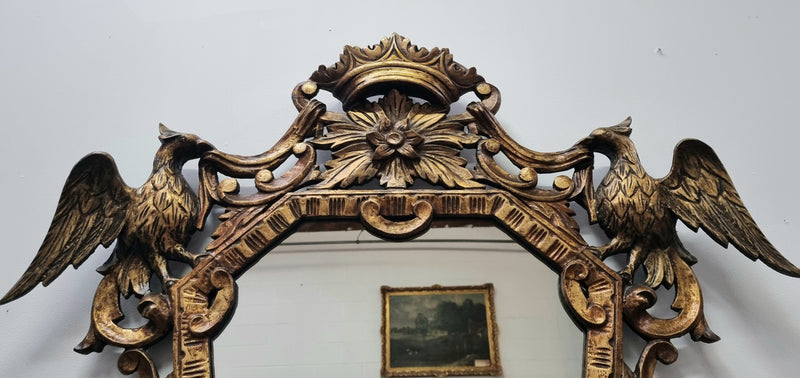 Interesting Italian gilt decorative framed mirror featuring birds. In good original condition.