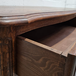 Lovely French nicely carved chest of 3 drawers with a parquetry top, with decorative handles and lovely carving. In good detailed condition.