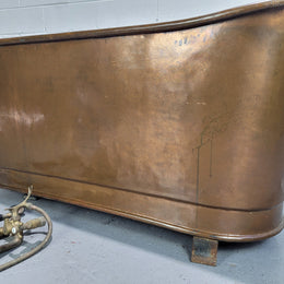 Sourced from France a rare full copper Antique bath tub on feet and includes an overflow, fittings, taps ect. In good original condition.