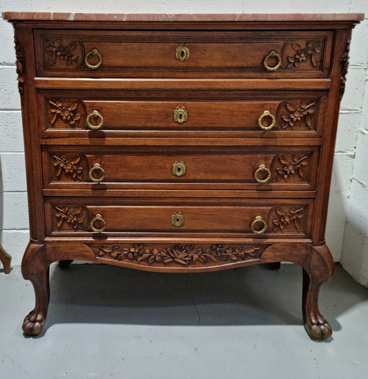 Lovely Antique French Walnut Renaissance style chest of four drawers with decorative handles and beautifully carved. There is a lovely marble top and in good original detailed condition.
