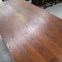 Spanish style French Oak farmhouse table with ironwork underneath. It is in good original detailed condition and has been sourced from France.