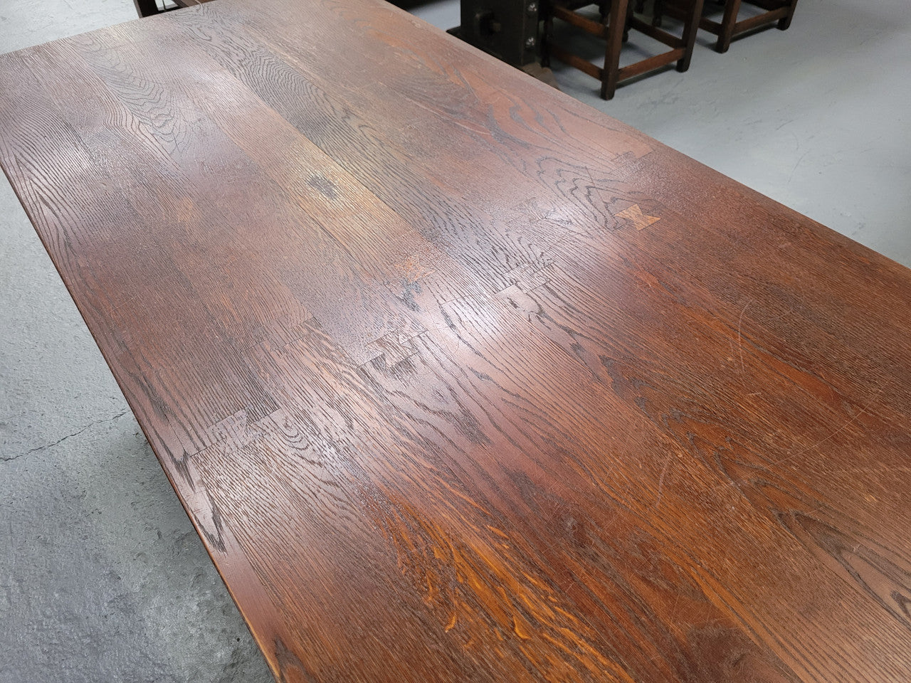 Spanish style French Oak farmhouse table with ironwork underneath. It is in good original detailed condition and has been sourced from France.