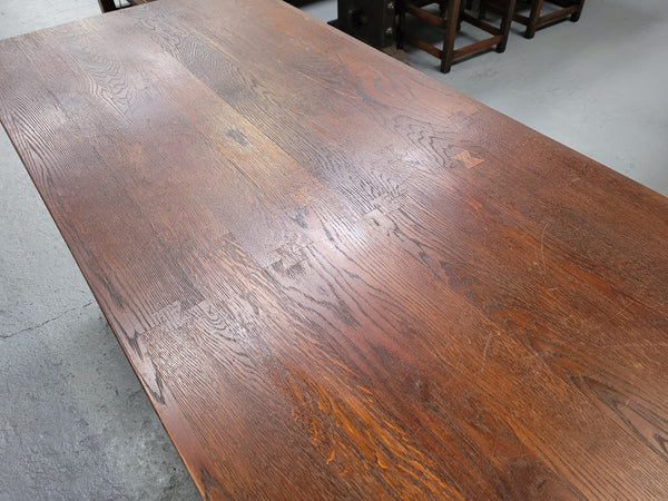Spanish style French Oak farmhouse table with ironwork underneath. It is in good original detailed condition and has been sourced from France.