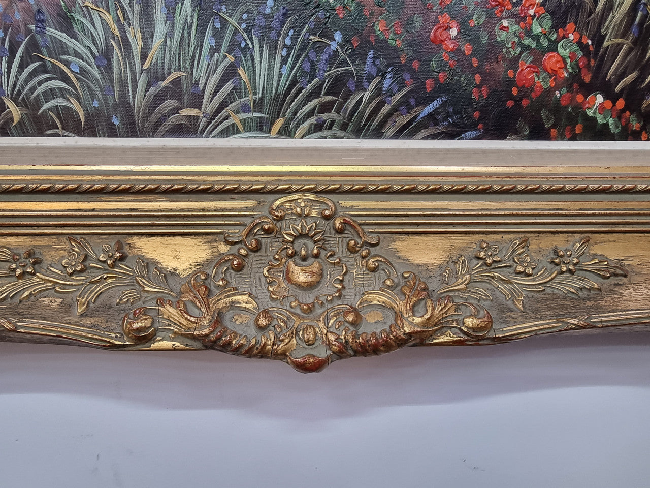 Sourced in France a colorful signed oil on canvas " Mediterranean coastal scene" in a decorative gilt frame. It is in good original detailed condition.