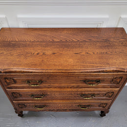 French Louis XV style Oak three drawer chest with wooden top. It has been sourced from France and is in good original detailed condition.