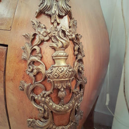 A large French Louis XV style Burr Walnut commode with a beautiful marble top. Has beautiful detailed mounts and plenty of storage space with two large drawers. From circa 1920 and in very good original condition.