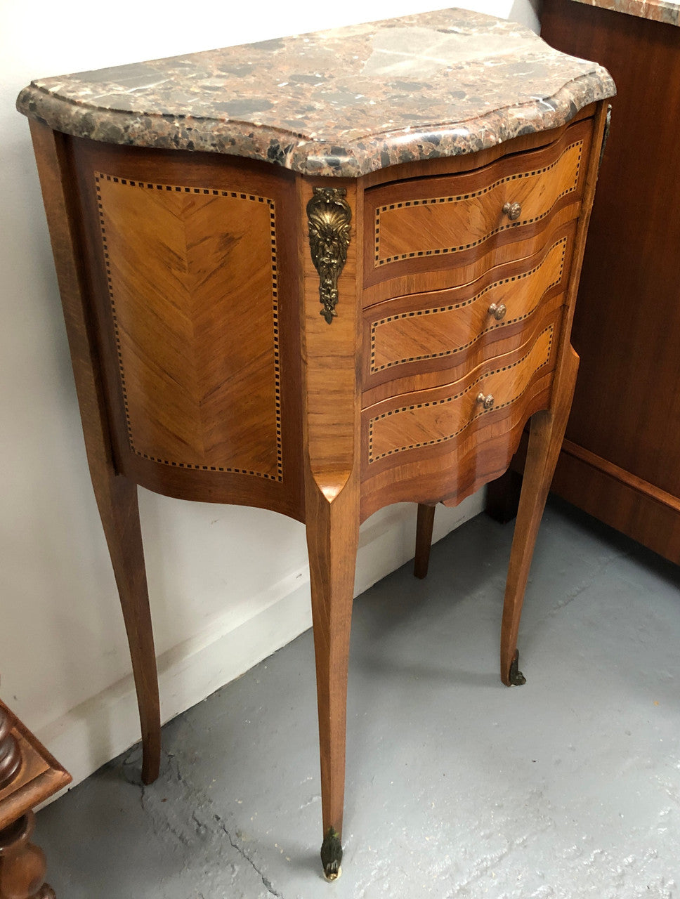 Single French commode marble top bedside with decorative inlay, ormolu mounts and a stunning coloured marble top.