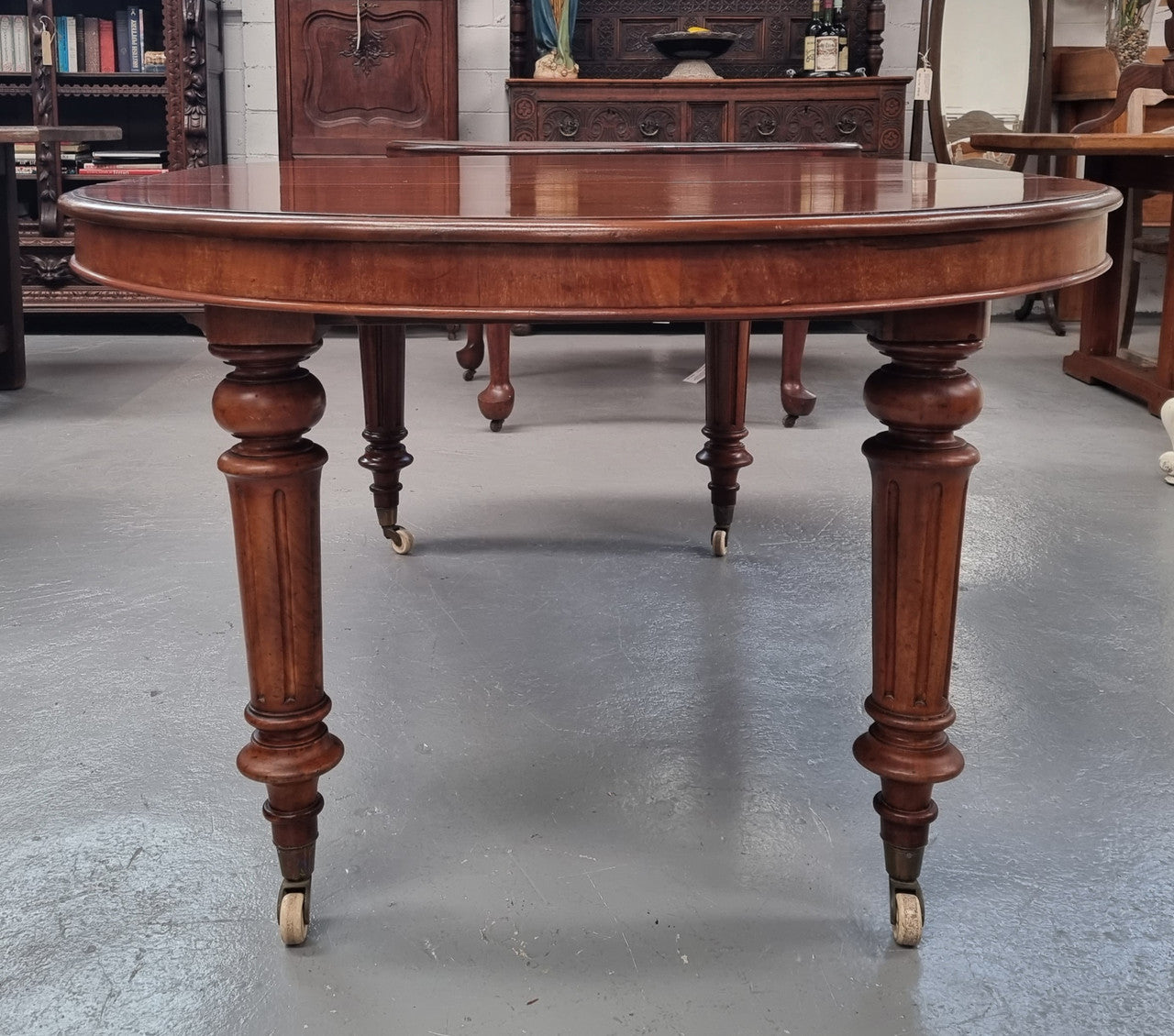 Amazing Victorian round Mahogany extension table. It comes with one extension leaf which can be added to the center of table when required. Sourced Locally and in good original detailed condition.