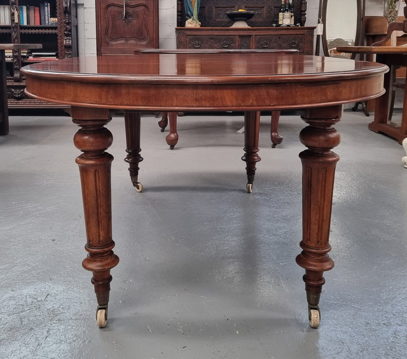 Amazing Victorian round Mahogany extension table. It comes with one extension leaf which can be added to the center of table when required. Sourced Locally and in good original detailed condition.