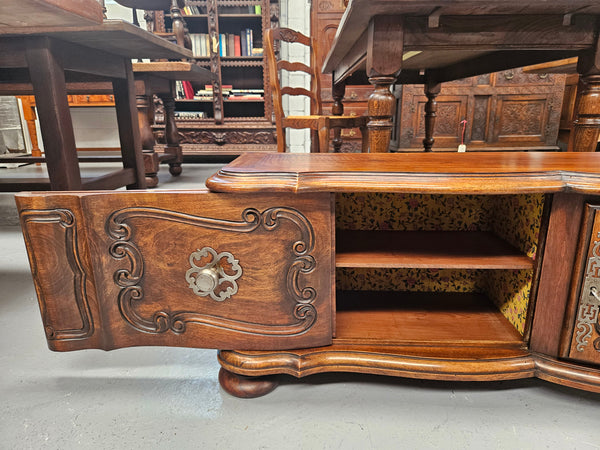 Appealing French Louis XVth style walnut converted TV unit.  Central carved  door & 2 Sliding Cupboards. In good condition.