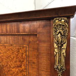 Beautiful Amboyna and Walnut Trumeau mirror. Has lovely parquetry inlay and is in good original condition.