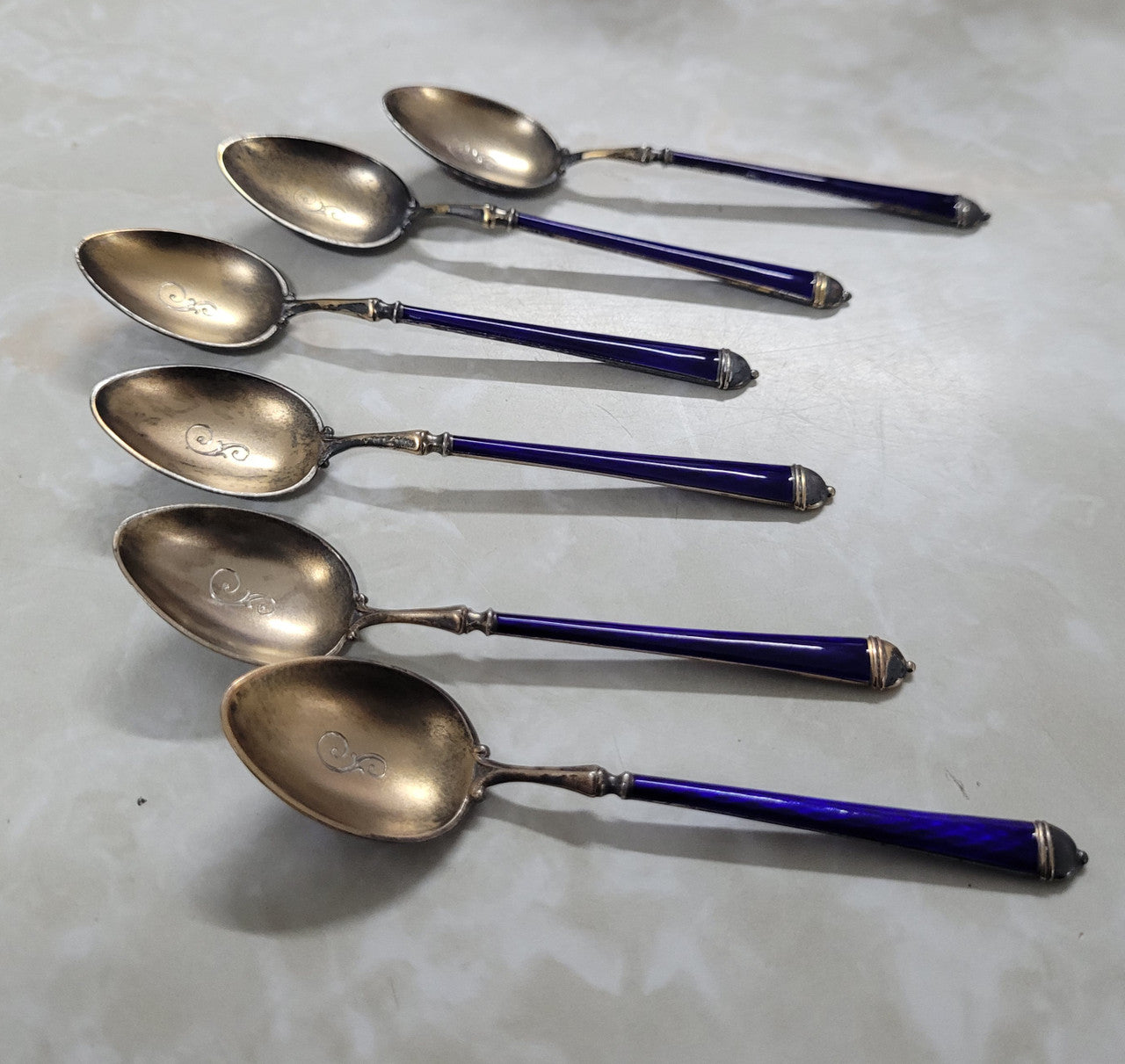 Stunning set of six 925 sterling silver and enamel spoons . In good original condition, please view photos as they help form part of the description.