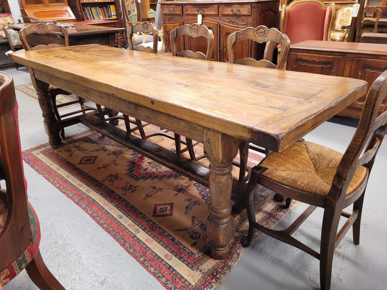 Large impressive 19th century 2.5 meter Antique French Oak farmhouse table. Loads of character with a stunning solid thick top and has a long drawer at one end. Sourced from France and in good original detailed condition.
