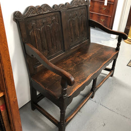 French 19th Century Oak hallway bench seat. Very comfortable to sit on and is in good original detailed condition.