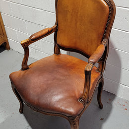 French Walnut Louis XV style desk chair with faux leather upholstery. The upholstery is in good original condition and very comfortable to sit in.