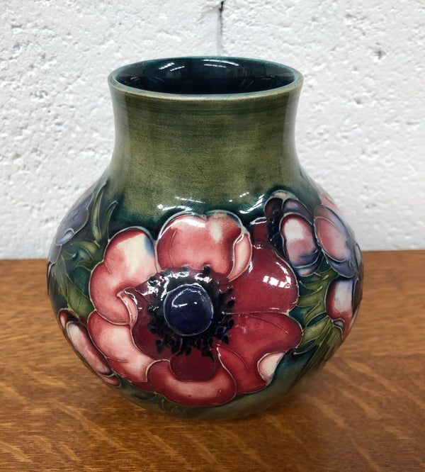 Anemone pattern hand-painted Moorcroft vase, in good condition.