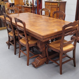 Amazing French Oak Renaissance style parquetry top extension table. Beautiful parquetry top and amazing detailed carvings on the legs. It extends to 306 cm long when fully extended. Sourced from France and in good original detailed condition.