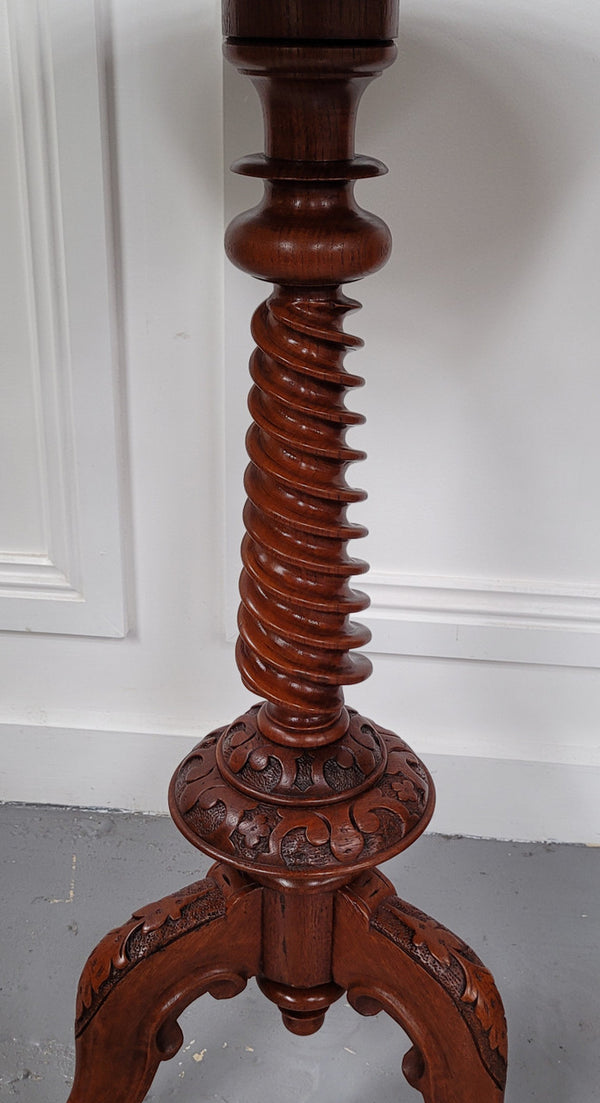 Rare early Victorian Irish Burr Walnut wine table. It has a beautiful carvings and a stunning burr walnut top, on a barley twist column and three shaped legs. It has been sourced locally and is in good original detailed condition. We also have a second table being sold separately which when together make a matched pair.