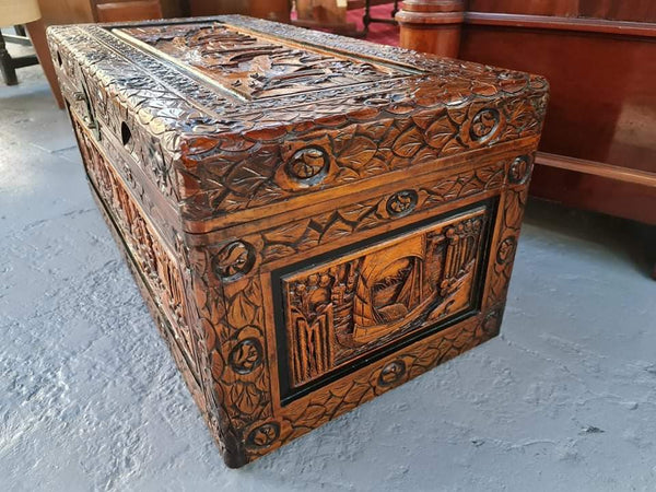 Charming Vintage Medium Size Camphor Wood Chest with Brass Closure. In original detailed condition.