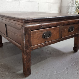 Square Elm coffee table with oriental legs and two long drawers.  Beautifully finished and in good original condition. It has been sourced from France.