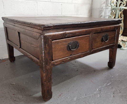 Square Elm coffee table with oriental legs and two long drawers.  Beautifully finished and in good original condition. It has been sourced from France.