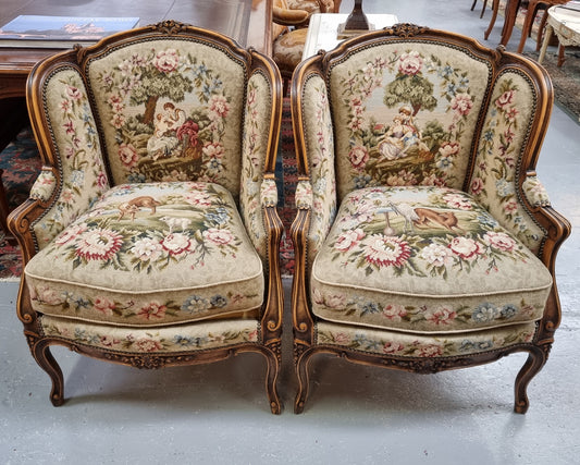 Pair of amazing French Walnut tapestry covered armchairs. The tapestry is in very good condition, please view photos as they form part of the description. Sourced from France and is in good original detailed condition.
