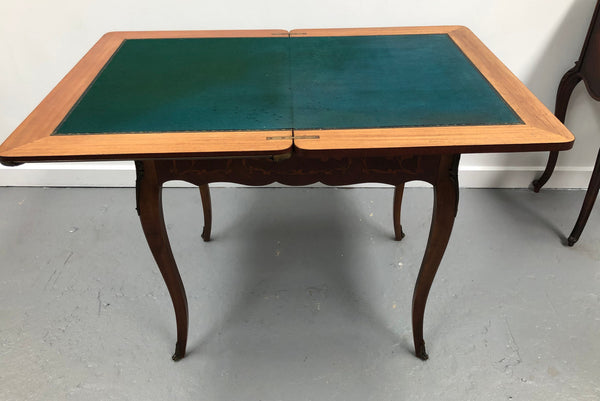 Beautiful french inlaid games table which includes internal drawers and bronze mounts. Internal drawers have counters and cards included.