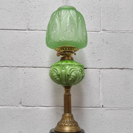 Beautiful Victorian green banquet lamp. It is in good condition, shade looks to be a later. It has been sourced locally.