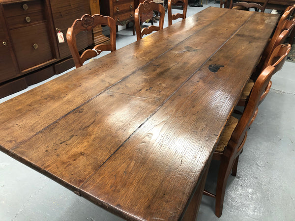 19th Century French three meter Farmhouse table with a beautiful original rustic top. In very good original detailed condition.