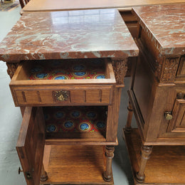 Pair French Oak Henry II style rouge marble topped bedside cabinets. Consisting of one drawer, one cupboard and a bottom shelf. Carved decoration and turned legs. Circa: 1900's.