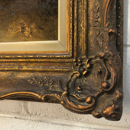 Sensational "Moody" oil on canvas landscape painting in a ornate gilt frame. In good original condition.