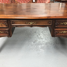 Antique French Walnut and parquetry top Louis XV style partners desk. In good original detailed condition.