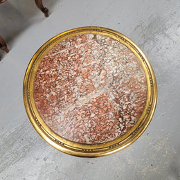 Late 19th Century French Louis XVI style round marble top side table/ lamp table. It is in good original detailed condition and has been sourced from France.