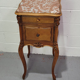 Single French Louis XV style Walnut inset marble top bedside. It has one drawer and one cupboard. It is in good original detailed condition.