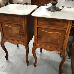 A beautiful pair of French walnut, marble top bedsides with a drawer and cupboard in good condition.