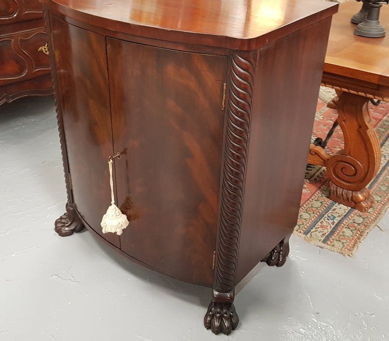 Antique Flame Mahogany Claw Foot Shoe Cupboard