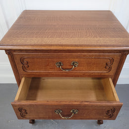 French Oak Louis XV style side drawers with lovely handles and three drawers. It has been sourced from France and is in good original detailed condition.