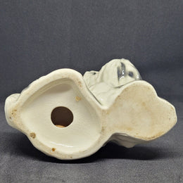 Charming vintage black and cream ceramic dog ornament. In good original condition.