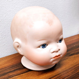 Large Bisque Dolls Head with beautiful blue eyes.  Marked on the back of the neck "Copy By Grace S utnam Made in Germany"  no chips or cracks please see photos as they form part of the description.