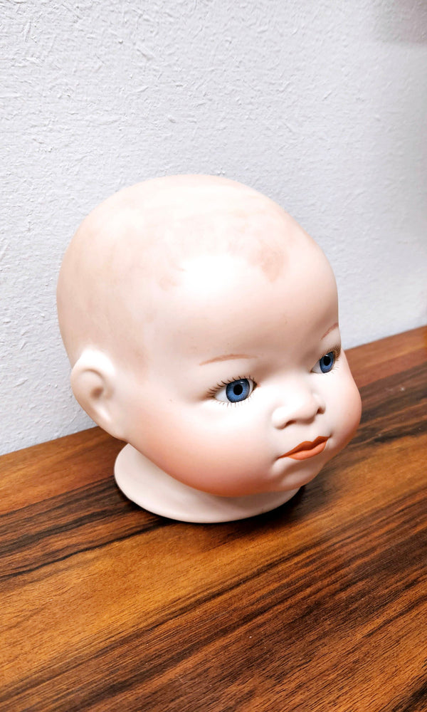 Large Bisque Dolls Head with beautiful blue eyes.  Marked on the back of the neck "Copy By Grace S utnam Made in Germany"  no chips or cracks please see photos as they form part of the description.