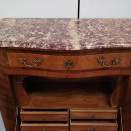Walnut Louis XV style marble top abbattant with beautiful parquetry inlay and ormolu mounts. It has plenty of storage space with four large drawers and four smaller internal drawers. Beautiful drop down desk with a leather insert. In very good original detailed condition.