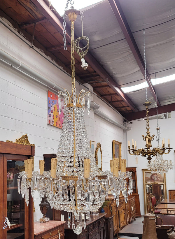 Fine French Empire basket shaped crystal chandelier. Consisting of ten exterior arms and four interior lights. It has stunning crystal's with prism drops. It has been sourced from France fully rewired to Australian standards.
