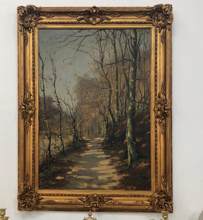 Beautiful Antique French oil on canvas of a path of trees, in a fabulous ornate frame and in good condition.