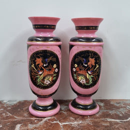 Late Victorian pink and hand painted, enameled pair of vases with some ware to enameling. It is in good original condition.